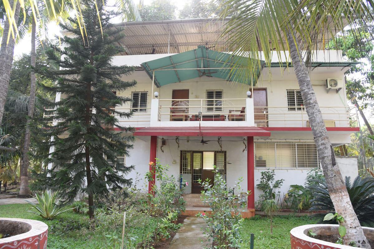 The two-storey cottage set in its garden